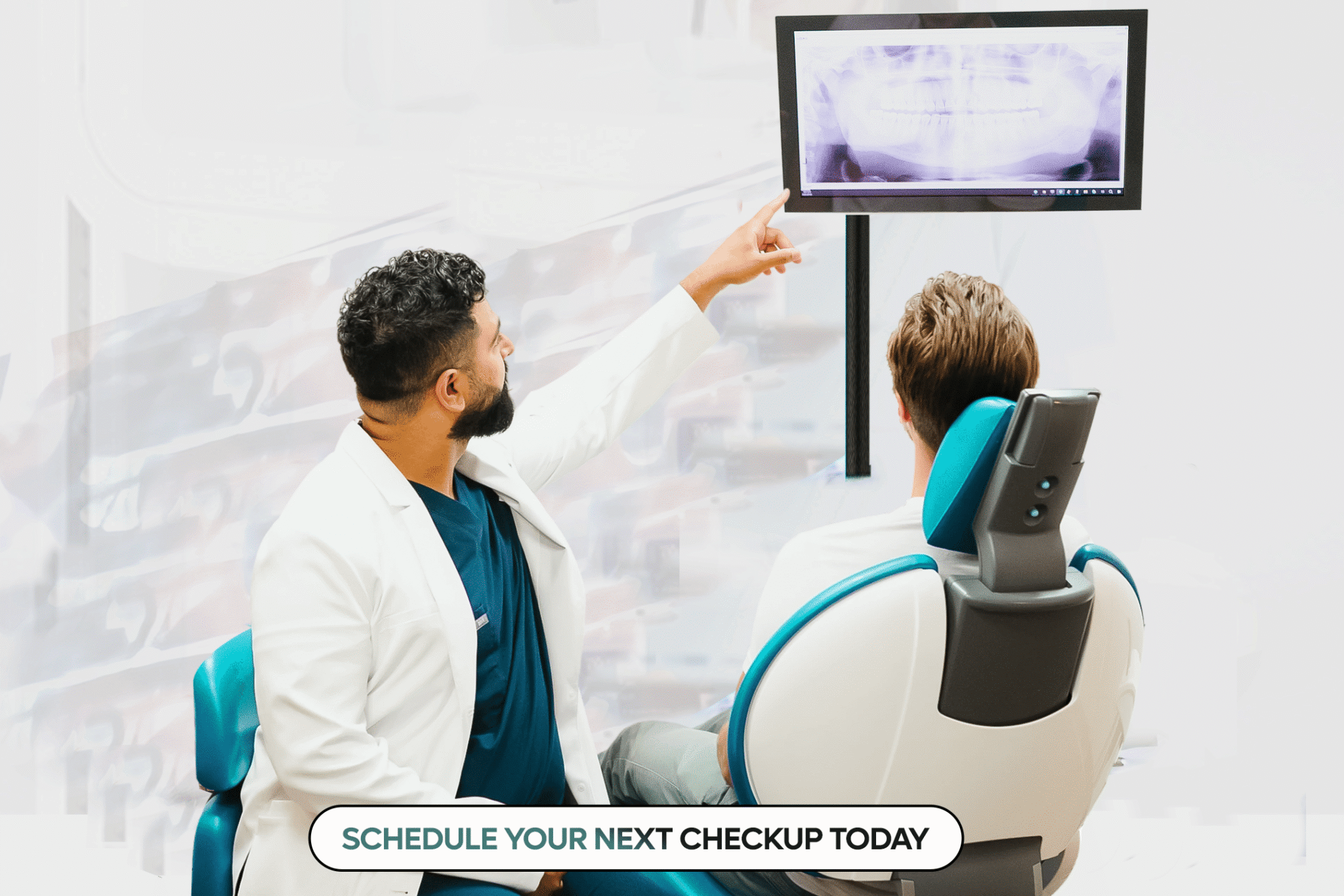 Dentist reviewing dental X-ray with patient during consultation in Sherwood Park