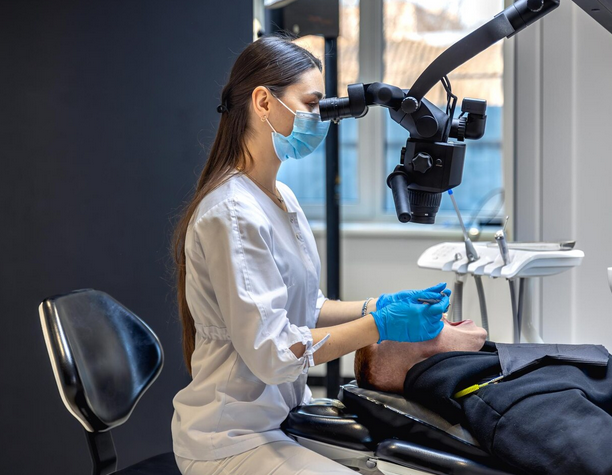 Dentist explaining dental results using digital technology to improve patient understanding
